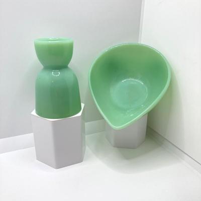 LOT 190: Vintage Jadeite Collection - Tear Drop Bowl, Egg Holder and Fire King Oven Ware Mixing Bowls