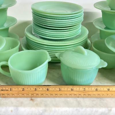LOT 192: Large Jadeite Fire King Oven Ware Set - Plates, Cups / Saucers and Cream / Sugar Bowls