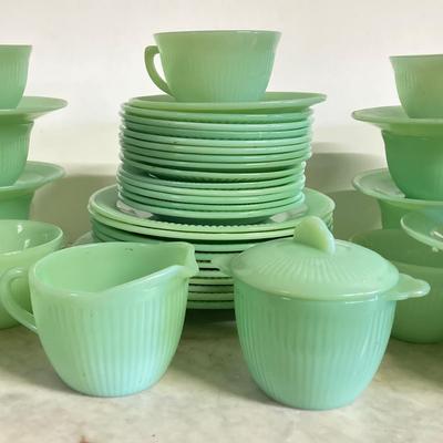 LOT 192: Large Jadeite Fire King Oven Ware Set - Plates, Cups / Saucers and Cream / Sugar Bowls