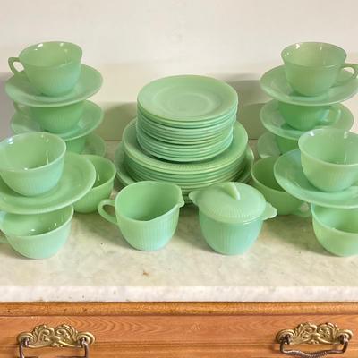 LOT 192: Large Jadeite Fire King Oven Ware Set - Plates, Cups / Saucers and Cream / Sugar Bowls