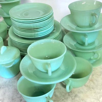 LOT 192: Large Jadeite Fire King Oven Ware Set - Plates, Cups / Saucers and Cream / Sugar Bowls