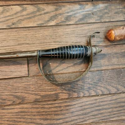 2 Walking Sticks Canes 2 Shoe Horns 1 Very heavy Brass 1 w a Sword handle