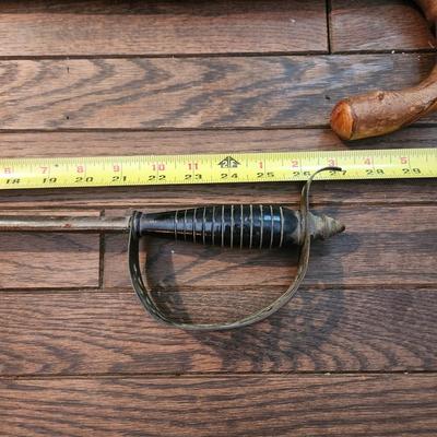 2 Walking Sticks Canes 2 Shoe Horns 1 Very heavy Brass 1 w a Sword handle