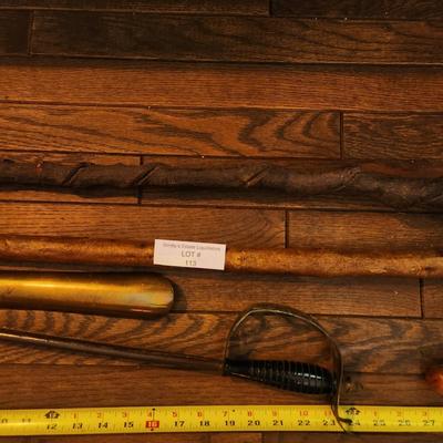 2 Walking Sticks Canes 2 Shoe Horns 1 Very heavy Brass 1 w a Sword handle