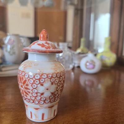 Tiny Antique Orange and White Jar