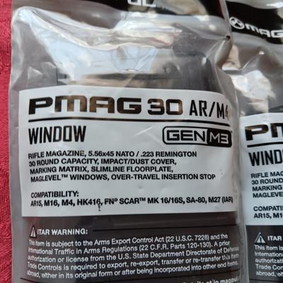 4 MAGPUL PMAG 30 AR/M4, HOLSTER AND A FOAM SKULL IN ROUGH SHAPE