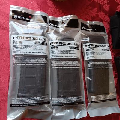 4 MAGPUL PMAG 30 AR/M4, HOLSTER AND A FOAM SKULL IN ROUGH SHAPE