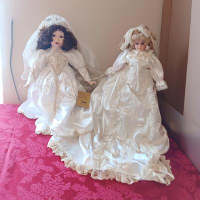 2 PORCELAIN DOLLS IN WEDDING DRESSES