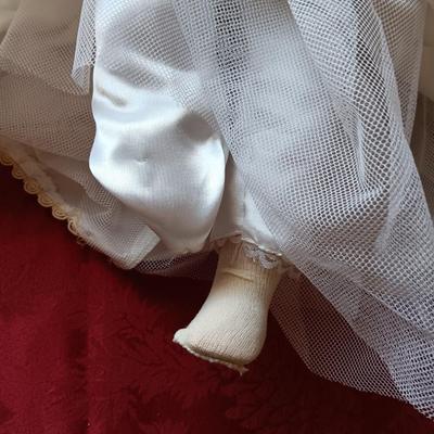 2 PORCELAIN DOLLS IN WEDDING DRESSES