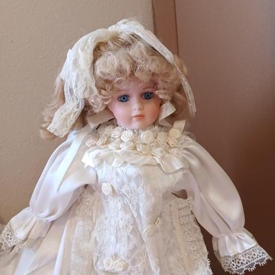 2 PORCELAIN DOLLS IN WEDDING DRESSES