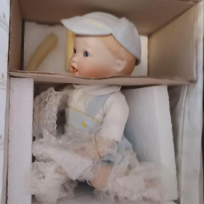 2 ASHTON-DRAKE "BABY'S FIRST TOOTH" PORCELAIN DOLLS