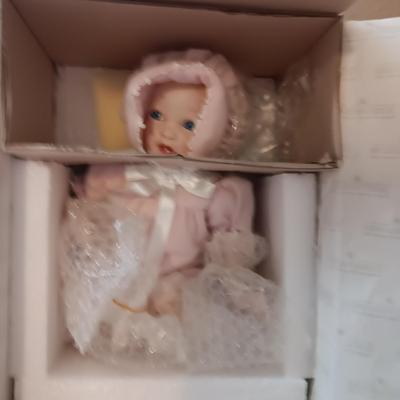 2 ASHTON-DRAKE "BABY'S FIRST TOOTH" PORCELAIN DOLLS
