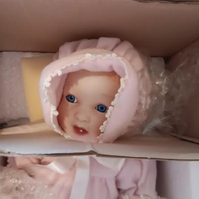 2 ASHTON-DRAKE "BABY'S FIRST TOOTH" PORCELAIN DOLLS