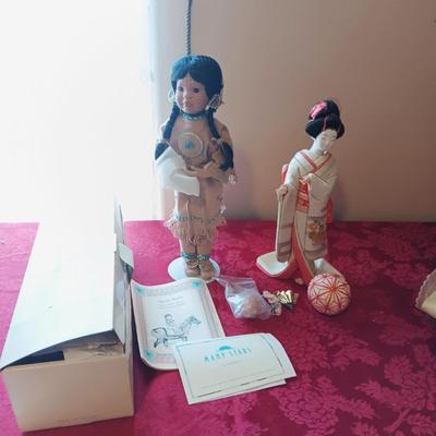 MANY STARS NATIVE AMERICAN THEMED DOLL AND A GEISHA PORCELAIN DOLL