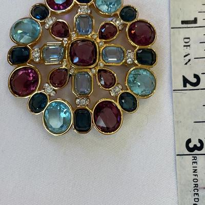 Large signed Swarovski multicolor crystal brooch