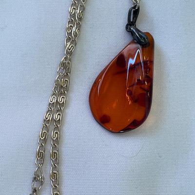 Two Baltic amber teardrop necklaces