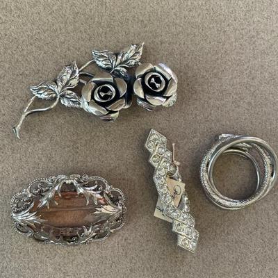 Silvertone brooches and Clip