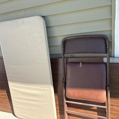 two folding tables and chair