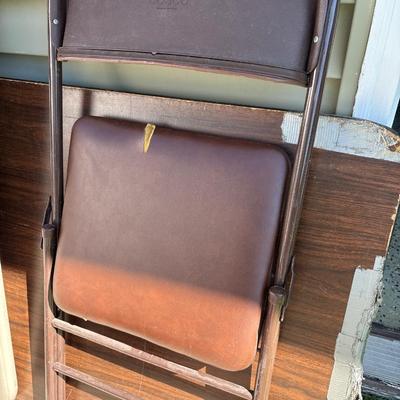 two folding tables and chair
