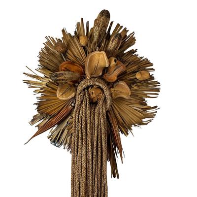 Sale Photo Thumbnail #1533: Made out of corn tusks, rope, and hallowed out nuts
Measurements:
55" in length, 18" in width
unknown artist