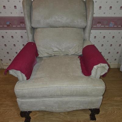 Tan Wingback chair.