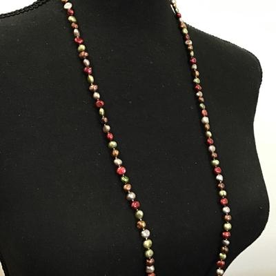 Gorgeous genuine, pearl necklace, rich and colors. Very nice.