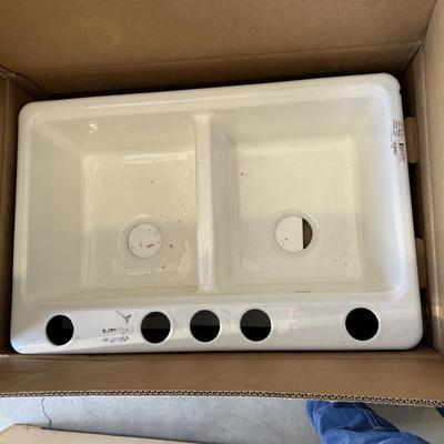 Sale Photo Thumbnail #47: This is new, but came with a minor blemish. As seen in the pictures. Overall this is a beautiful sink. It is the one chip. 
Kohler K-8679-5UA3-0
Color- white. 
Still in box.