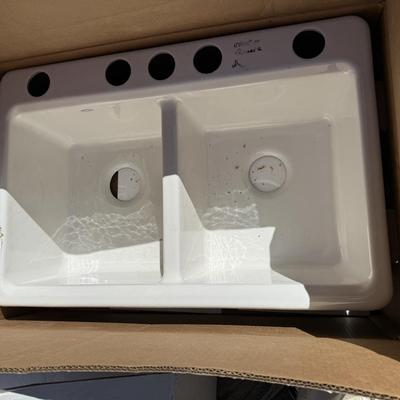 Sale Photo Thumbnail #48: This is new, but came with a minor blemish. As seen in the pictures. Overall this is a beautiful sink. It is the one chip. 
Kohler K-8679-5UA3-0
Color- white. 
Still in box.