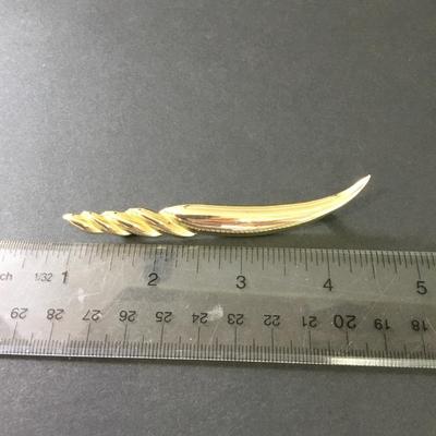 Vintage, gold tone, seashell, or screw shell brooch