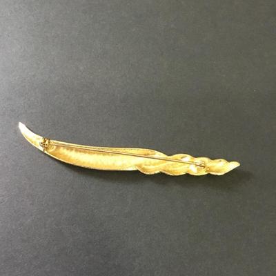 Vintage, gold tone, seashell, or screw shell brooch