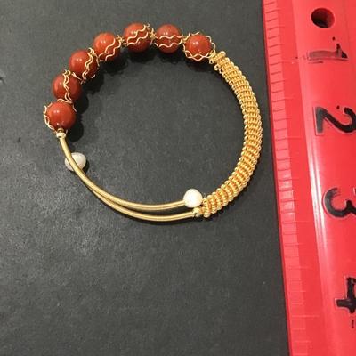 Sale Photo Thumbnail #173: Gold, toned fashion bracelet. Please see attached photos.