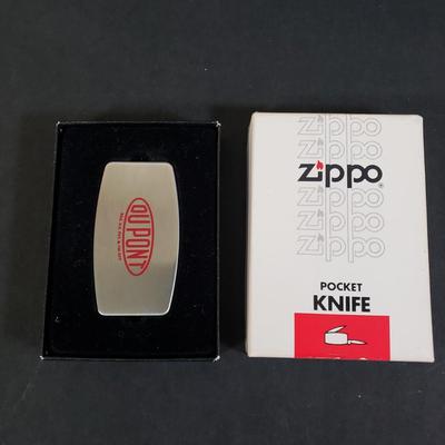 LOT 81D: DuPont Collection; Zippo Pocket Knife, Bookends and More