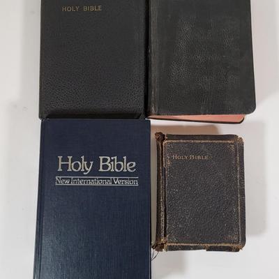 LOT 109B: Eight Various Sized Bibles with Four Contained in Book Box Cover
