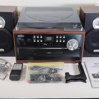 LOT 111L: Jensen JTA-475 3-Speed Turntable with CD, Cassette, and AM/FM Stereo Radio