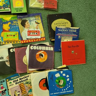 LOT 112L: Assorted Vintage Children VHS Tapes and Vinyl Records