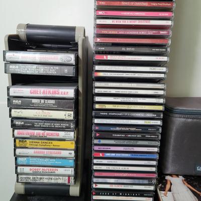 LOT 115L: CD and Cassette Tapes Storage Filled with Assorted Albums and Artists