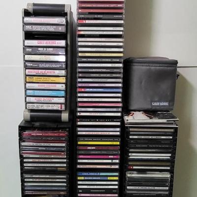 LOT 115L: CD and Cassette Tapes Storage Filled with Assorted Albums and Artists