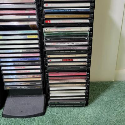 LOT 115L: CD and Cassette Tapes Storage Filled with Assorted Albums and Artists