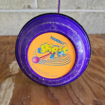 LOT 117G: Vintage Metal POGO Stick and Purple Skip It Toy