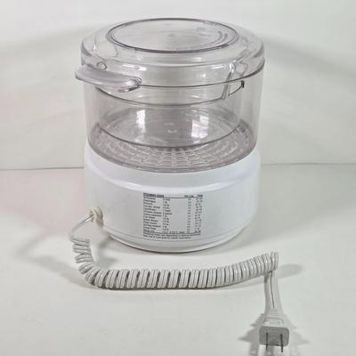 LOT 147D: Kitchen Must Haves. A Black & Decker Automatic Jar Opener, Electric Can Opener, Handy Steamer Rice Cooker & A...