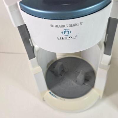 LOT 147D: Kitchen Must Haves. A Black & Decker Automatic Jar Opener, Electric Can Opener, Handy Steamer Rice Cooker & A...