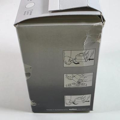 LOT 147D: Kitchen Must Haves. A Black & Decker Automatic Jar Opener, Electric Can Opener, Handy Steamer Rice Cooker & A...