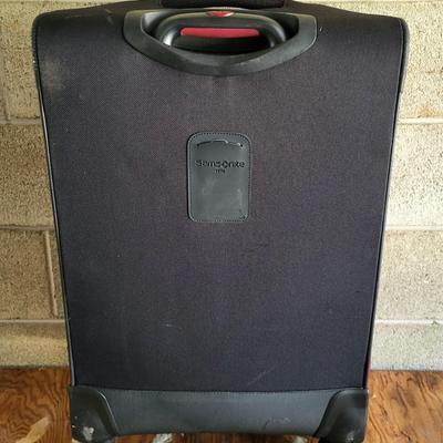 LOT 202G: Three Red and Black Travel Luggage with Various Accessories