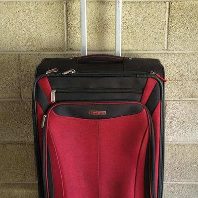 LOT 202G: Three Red and Black Travel Luggage with Various Accessories