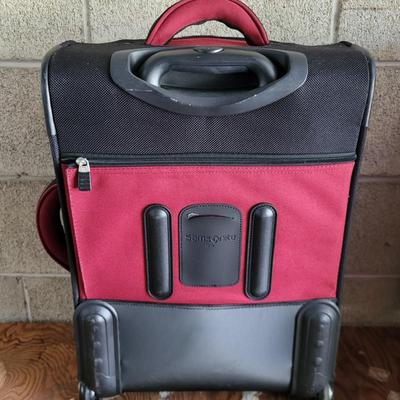 LOT 202G: Three Red and Black Travel Luggage with Various Accessories