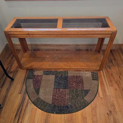 Oak & Glass Display Console Table with Lower Shelf and a Half circle shaped rug