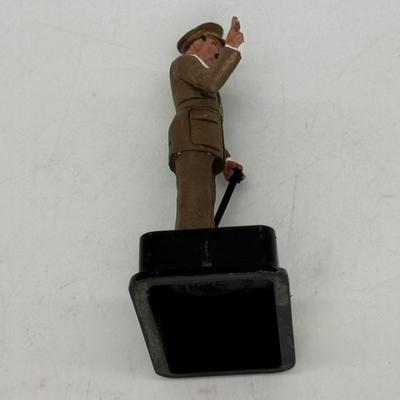 Sale Photo Thumbnail #293: In a WWII British Army uniform. Made in Spain by Alymer. In good vintage condition, but one finger in the "V" for victory sign is slightly bent.