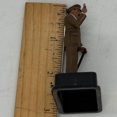 Sale Photo Thumbnail #292: In a WWII British Army uniform. Made in Spain by Alymer. In good vintage condition, but one finger in the "V" for victory sign is slightly bent.