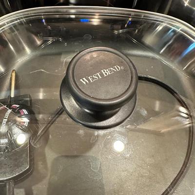 STOCK POTS AND AN ELECTRIC FRYING PAN