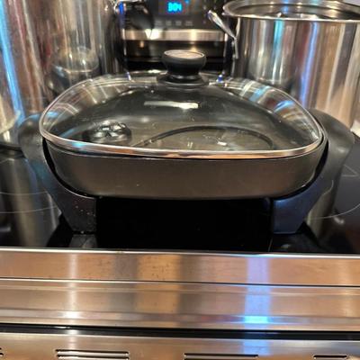 STOCK POTS AND AN ELECTRIC FRYING PAN